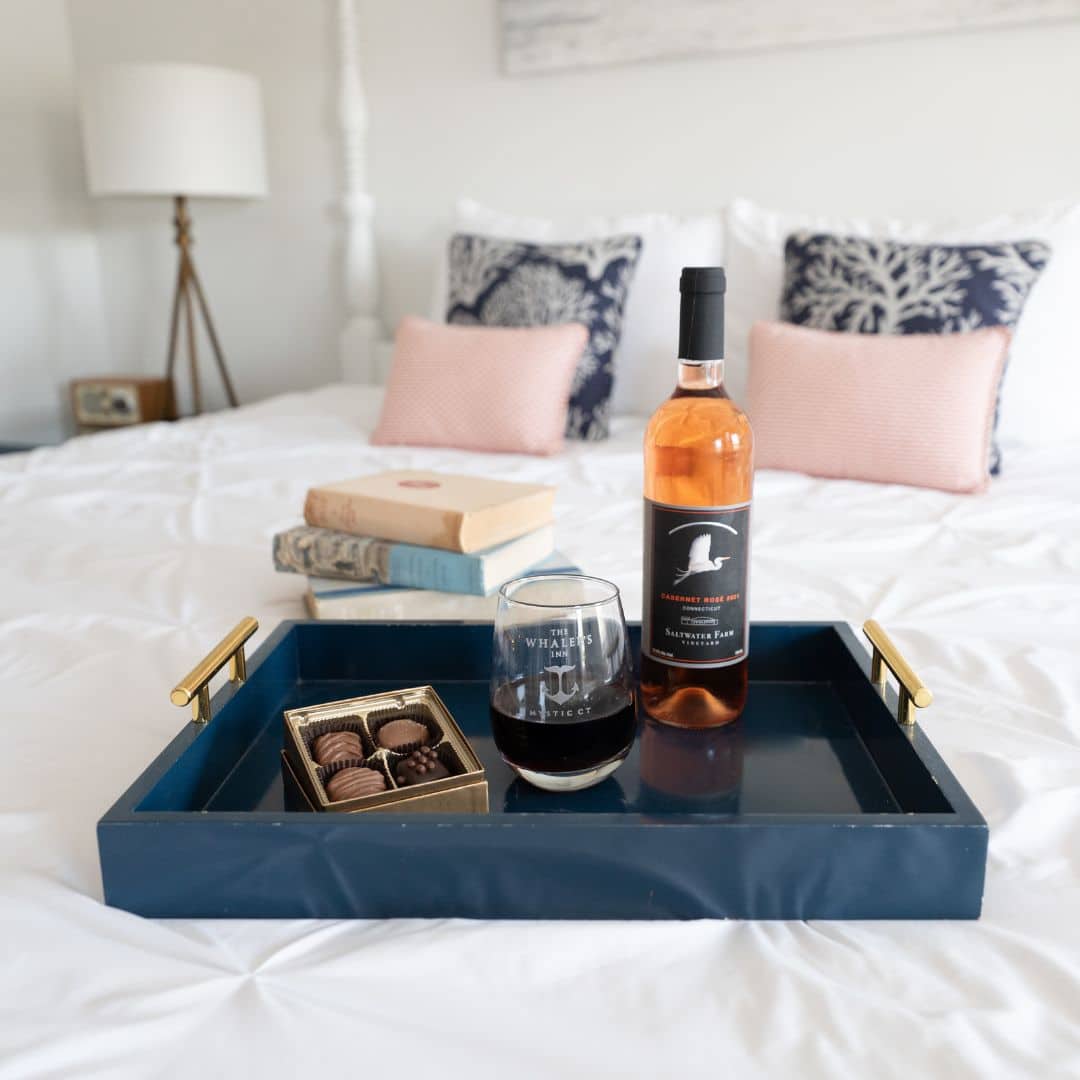 Wine and chocolates in a guest room at our top-rated Mystic Hotel