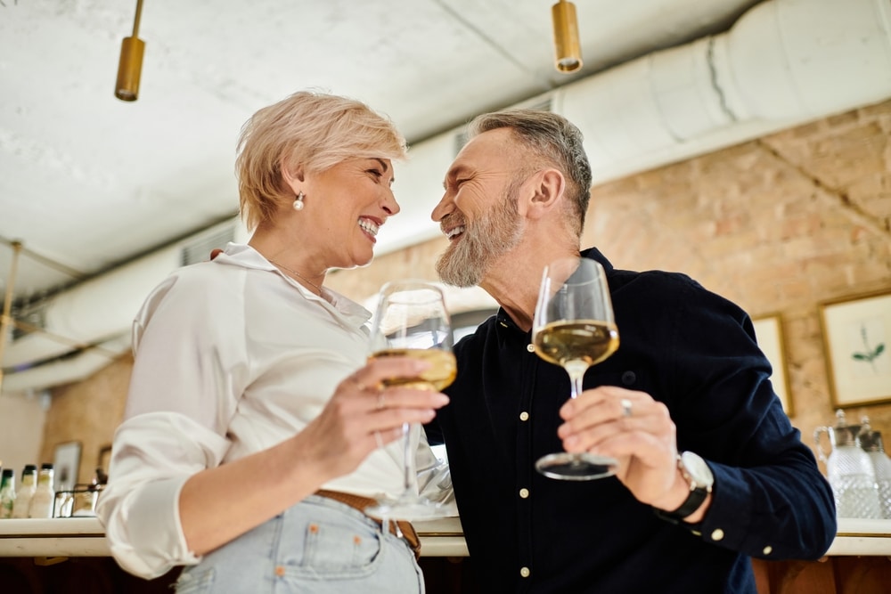 Couple drinking wine at the top wineries near Mystic CT